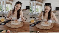 Terlihat enak! Enzy menikmati sarapan pancake dan jus jeruk di villa.  Foto: Instagram @enzystoria