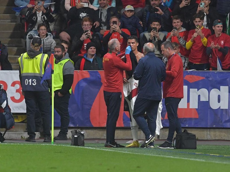 Portugal's forward Cristiano Ronaldo receives medical treatment during the UEFA Nations League, league A group 2 football match between Czech Republic and Portugal at the Fortuna Arena in Prague, Czech Republic, on September 24, 2022. (Photo by Michal Cizek / AFP) (Photo by MICHAL CIZEK/AFP via Getty Images)
