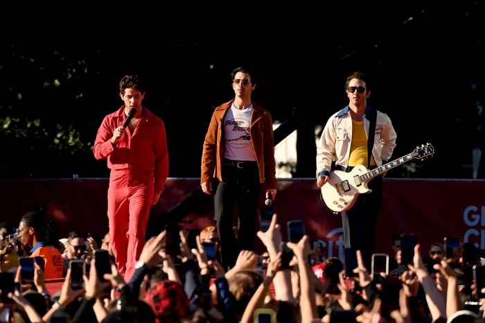 NEW YORK, NEW YORK - SEPTEMBER 24: Nick Jonas, Joe Jonas and Kevin Jonas of the Jonas Brothers perform onstage during Global Citizen Festival 2022: New York at Central Park on September 24, 2022 in New York City. (Photo by Noam Galai/Getty Images)