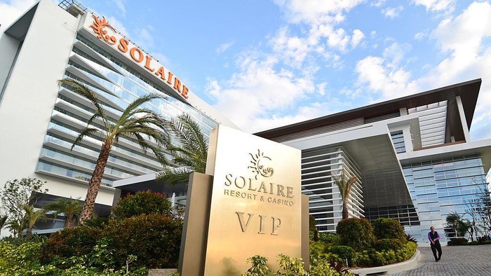 MANILA, PHILIPPINES - MARCH 16:  Security assists vehicles during the grand opening of the Solaire resort and casino on March 16, 2013 in Paranaque City, Philippines. The Solaire group have invested USD $1.2 billion into the high-end casino, and are banking on luring VIP gamblers away from Macau. The sprawling casino resort sits on 60 hectares of reclaimed land in Manila Bay and is the first of four huge casino venues that are set to be built one year after the other. Shares in Solaire have risen 60 per cent in the past six months on anticipation of fast returns on the investment, and numerous other casino groups globally will be watching to see if the investment by Solaire pays off.  (Photo by Dondi Tawatao/Getty Images)