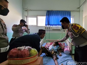 Aksi Polisi Sukabumi Bantu Bocah Pengidap Komplikasi Penyakit