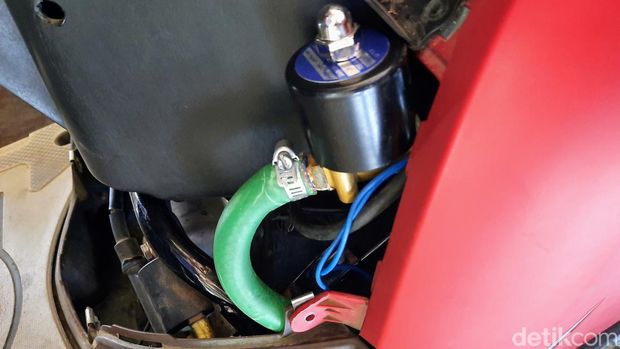 Sepeda motor berbahan bakar bensin yang dikonversi menjadi berbahan bakar elpiji