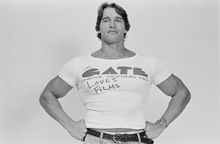 Austrian-born American actor Arnold Schwarzenegger in London to publicise the Gate Cinema in Notting Hill, 1977. (Photo by Estate Of Keith Morris/Redferns/Getty Images)