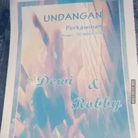 Mungkin kedua calon pengantinnya penggemar berat Spiderman. Nggak heran sampai sampul undangan pernikahannya saja bergambar Spiderman. Foto: 1cak.com