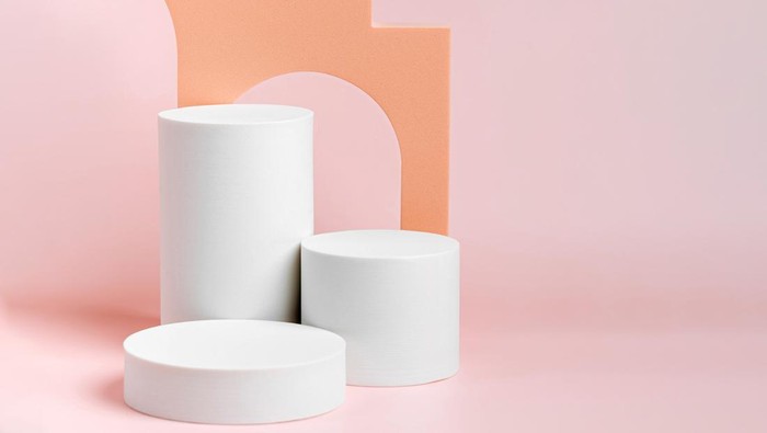 Cylinder podium with stairs and arch. Abstract background with various geometric shapes in pastel color for product presentation. Podium to show cosmetic products.