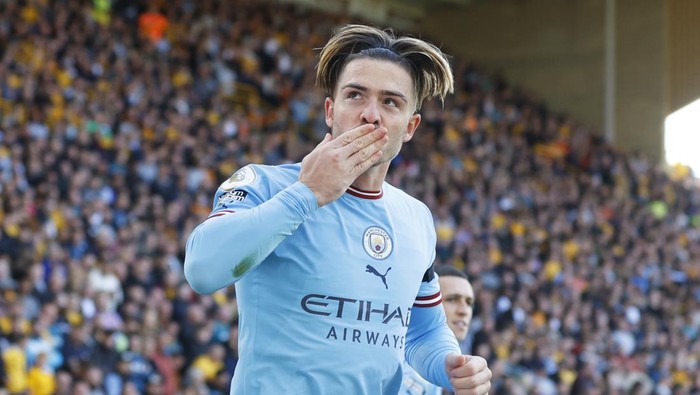 WOLVERHAMPTON, ENGLAND - SEPTEMBER 17: Jack Grealish of Manchester City celebrates after scoring their sides first goal during the Premier League match between Wolverhampton Wanderers and Manchester City at Molineux on September 17, 2022 in Wolverhampton, England. (Photo by Lynne Cameron - Manchester City/Manchester City FC via Getty Images)