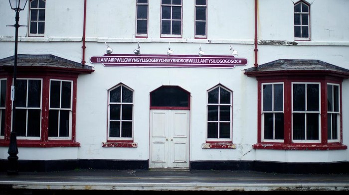 1282875699 BANGOR, WALES - OCTOBER 29: The train station at Llanfairpwllgwyngyllgogerychwyrndrobwllllantysiliogogogoch which has been closed since July and remains deserted during the firebreak lockdown on October 29, 2020 in Bangor, Wales. In the first week of Wales'