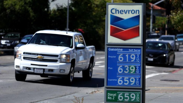 GREENBRAE, CALIFORNIA - SEPTEMBER 27: A pedestrian walks by a display of gas prices over $6.00 a gallon at a Chevron gas station on September 27, 2022 in Greenbrae, California. Gas prices in the San Francisco Bay Area have surged over 40 cents in the past week to an average of $6.05 in San Francisco. The national average for a gallon of regular gasoline is $3.70. (Photo by Justin Sullivan/Getty Images)