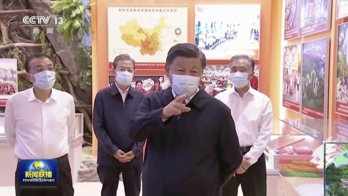 In this image taken from video footage run by Chinas CCTV, Chinese President Xi Jinping and other Chinese leaders visit an exhibit with the theme of 