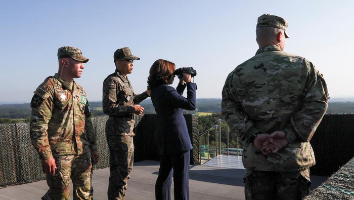 U.S. Vice President Kamala Harris uses binoculars at the military observation post as she visits the demilitarized zone (DMZ) separating the two Koreas, in Panmunjom, South Korea, September 29, 2022. REUTERS/Leah Millis/Pool