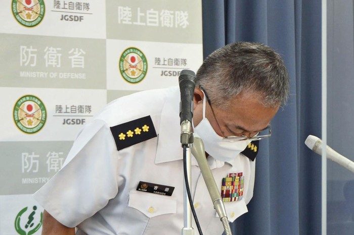 Yoshihide Yoshida, head of Japan’s Ground Self-Defense Force apologize during a news conference in Tokyo Thursday, Sept. 29, 2022. Yoshida apologized to a former soldier for her 