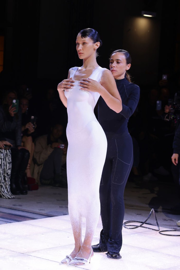 Bella Hadid (EDITORIAL USE ONLY - For Non-Editorial use please seek approval from Fashion House) Performance of fashion model Bella Hadid during the Coperni Womenswear Spring/Summer 2023 show as part of Paris Fashion Week on September 30, 2022 in Paris, France. (Photo by Estrop/Getty Images)