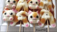 Tak hanya anjing, ada juga rice cake kenyal yang dibentuk menjadi wajah dan kaki kucing. Foto: Instagram @nao2748