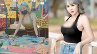 Pedagang susu kedelai di Thailand punya cara sendiri untuk menarik pelanggan. Wanita itu memilih memakai pakaian seksi saat berjualan, belahan dadanya pun terlihat jelas.(Foto: Sanook)
