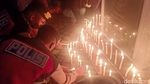 Suporter-Polisi Banjarnegara Nyalakan Lilin untuk Korban Tragedi Kanjuruhan