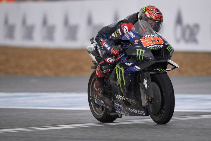 BURIRAM, THAILAND - OCTOBER 02:  Fabio Quartararo of France and Monster Energy Yamaha MotoGP Team heads down a straight  during the MotoGP race during the MotoGP of Thailand - Race at Chang International Circuit on October 02, 2022 in Buriram, Thailand. (Photo by Mirco Lazzari gp/Getty Images)