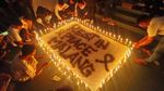 Aksi Bakar Lilin dan Doa Bersama Suporter Sepak Bola di Lampung