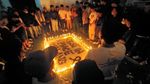 Aksi Bakar Lilin dan Doa Bersama Suporter Sepak Bola di Lampung