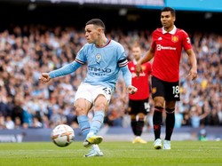 Foden yang memulai, Foden pula yang mengakhiri. Ia mencetak gol terakhir Man City ke gawang MU. Foto: Manchester City FC via Getty Ima/Lynne Cameron - Manchester City