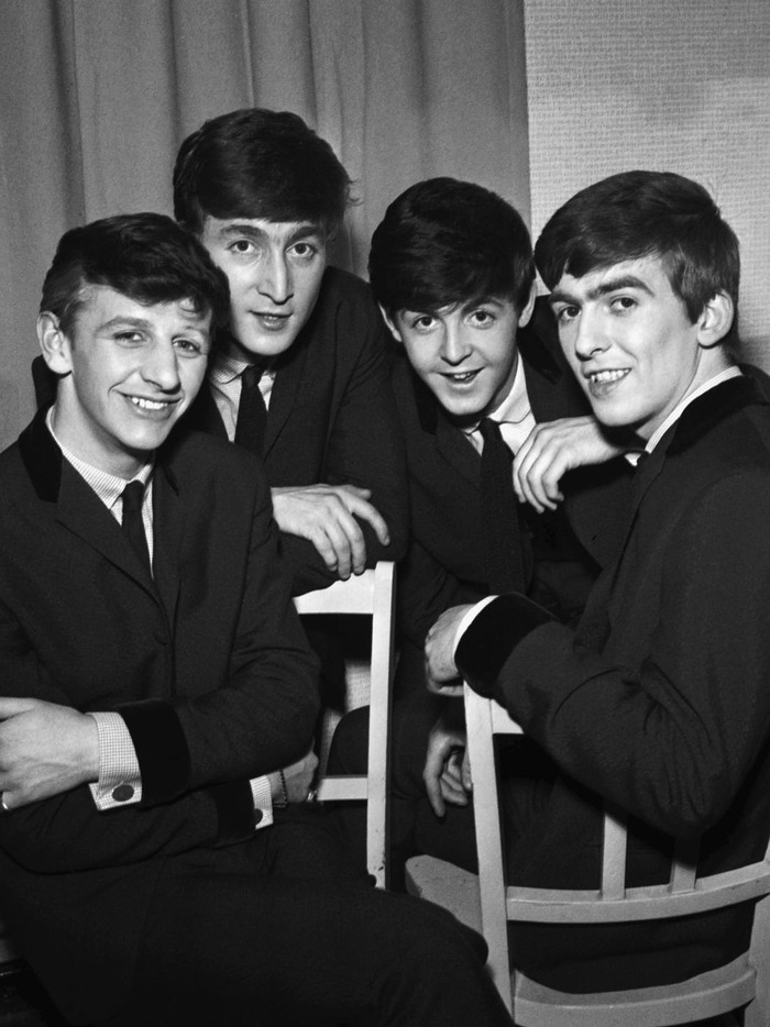 112058656 The Beatles pose for an eraly group portrait, backstage, (L-R) Ringo Starr, John Lennon, Paul McCartney, George Harrison, 1962. (Photo by Harry Hammond/V&A Images/Getty Images)