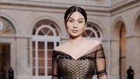 Ariel Tatum dalam unggahan di Instagram mengungkap makna dari busana yang dikenakannya. Dia menyebut gaun itu tentang kehidupan. Instagram/@arieltatum