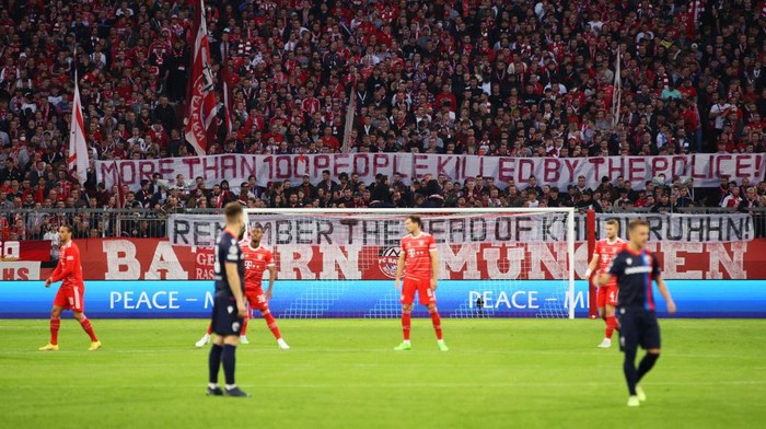 MUNICH, GERMANY - OCTOBER 04: 	Bayern Munich fans hold a banner during the UEFA Champions League group C match between FC Bayern München and Viktoria Plzen at Allianz Arena on October 04, 2022 in Munich, Germany. (Photo by Adam Pretty/Getty Images)