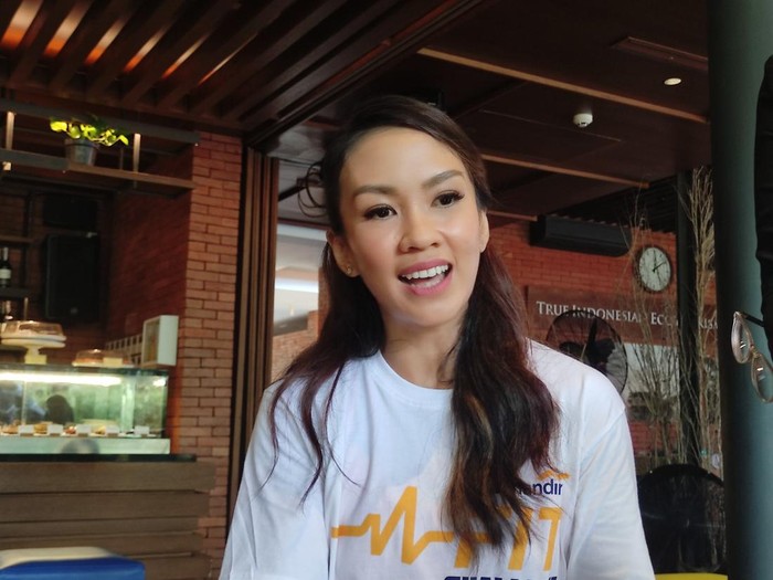 Melanie Putria-AXA Mandiri