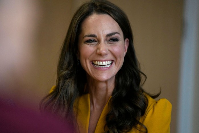 GUILDFORD, ENGLAND - OCTOBER 05: Catherine, Princess of Wales smiles during a visit to the Royal Surrey County Hospital's Maternity Unit at Royal Surrey County Hospital on October 5, 2022 in Guildford, England. (Photo by Alastair Grant - WPA Pool/Getty Images)