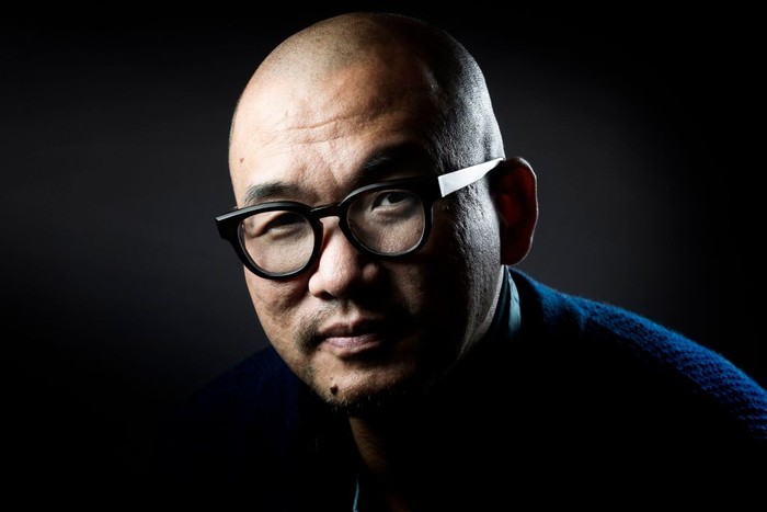 Ilustrator Korea Kim Jung Gi Meninggal Dunia South Korean comic streep writer Kim Jung-gi poses in Paris on March 16, 2016. (Photo by JOEL SAGET / AFP) / BLACK AND WHITE VERSION (Photo credit should read JOEL SAGET/AFP via Getty Images)