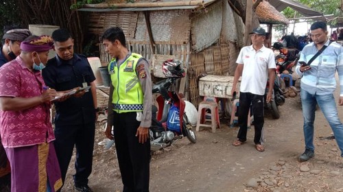 Situasi Pantai Banjar Dinas Tegalinggah, Desa Les, Kecamatan Tejakula, Buleleng pasca adanya laporan dua orang nelayan hilang saat melaut, Kamis (6/10/2022).