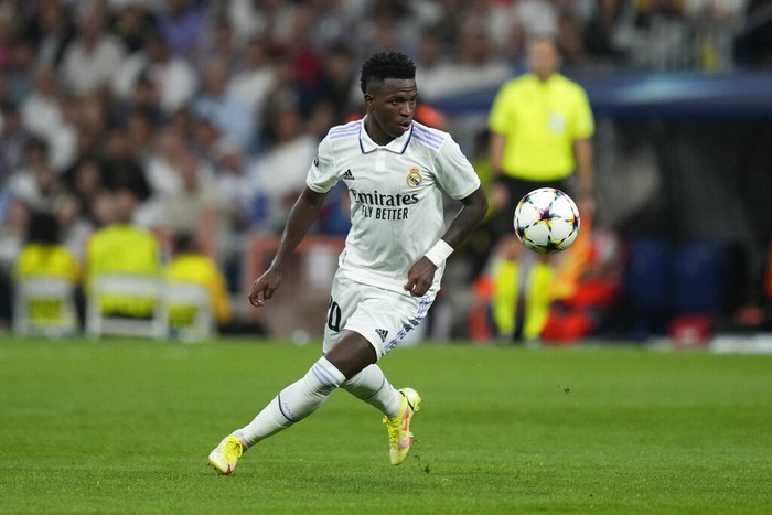 Real Madrids Karim Benzema, fails to score Real Madrids Vinicius Junior runs for the ball during the Champions League group F soccer match between Real Madrid and Shakhtar Donetsk at the Santiago Bernabeu stadium in Madrid, Wednesday, Oct. 5, 2022. (AP Photo/Bernat Armangue)