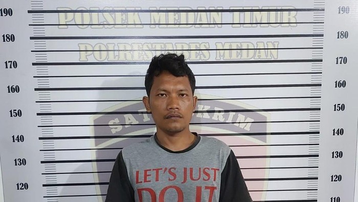 Roni Leo Purba, pelaku pembacokan usai diciduk polisi.