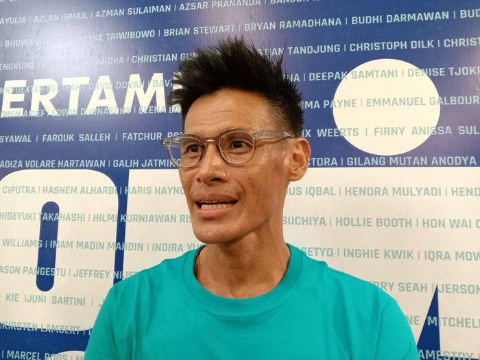 Andy Wibowo (42) peserta asal Bali menjadi yang tercepat di event triatlon Ironman 70.3 di Lombok, Sabtu (8/10/2022). (Foto: Ahmad Viqi/detikBali)