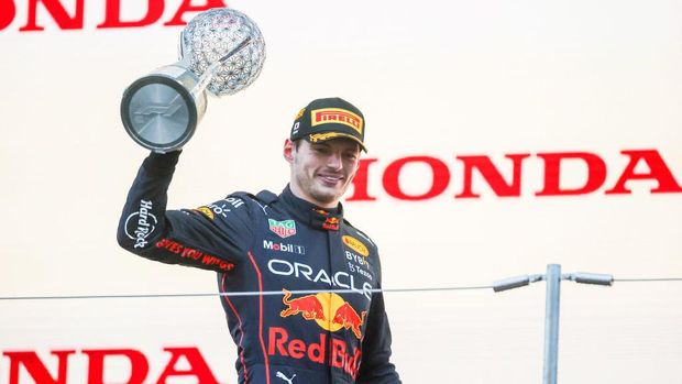 SUZUKA, JAPAN - OCTOBER 09: Max Verstappen of Red Bull Racing and The Netherlands celebrates finishing in first position and becoming the 2022 F1 Drivers World Champion during the F1 Grand Prix of Japan at Suzuka International Racing Course on October 09, 2022 in Suzuka, Japan. (Photo by Peter Fox/Getty Images)