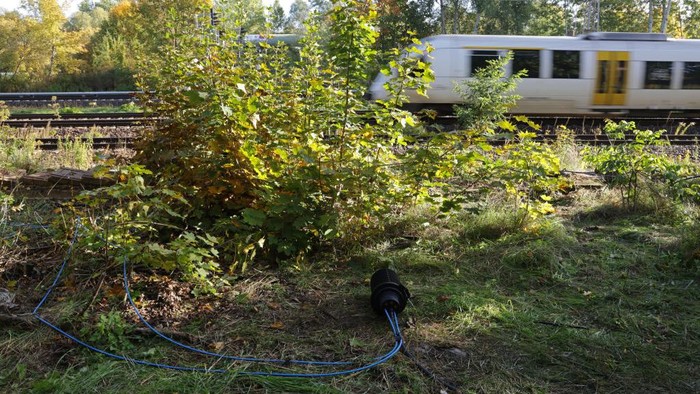 BERLIN, GERMANY - OCTOBER 09: Newly-laid cable lies next to railway tracks at the spot in Hohenschoenhausen district where the day before technicians repaired a section of fibre optic cable that had been severed in an act of sabotage on October 09, 2022 in Berlin, Germany. Unknown assailants purposefully severed GSM-R cables of German state rail carrier Deutsche Bahn critical to communications yesterday in Berlin and Dortmund, leading to a three-hour total disruption of railway service across northern Germany. Police are investigating. (Photo by Sean Gallup/Getty Images)