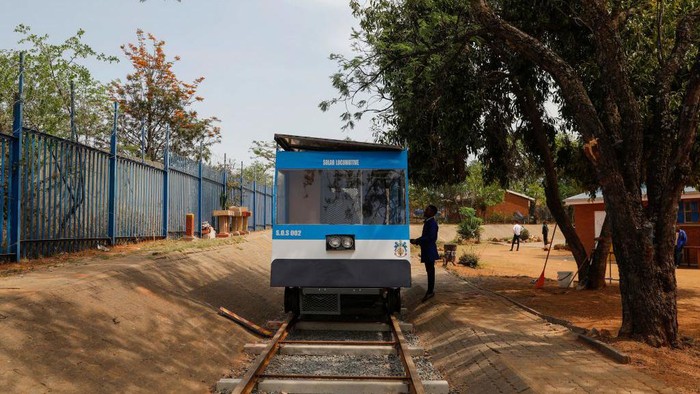 This photograph taken on September 20, 2022 shows a solar-powered train built by students of Soshanguve technical high school in Soshanguve townshipn in the northern suburbs of Pretoria. - The group of 20 teens have invented South Africa's first fully solar-powered train as for the past few years, students in a South African township have watched in frustration as their parents failed to use trains for daily commutes to work amid a crippling energy crisis. (Photo by Phill Magakoe / AFP) (Photo by PHILL MAGAKOE/AFP via Getty Images)