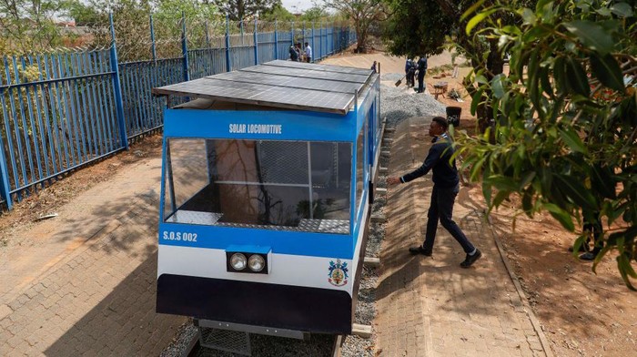 This photograph taken on September 20, 2022 shows a solar-powered train built by students of Soshanguve technical high school in Soshanguve townshipn in the northern suburbs of Pretoria. - The group of 20 teens have invented South Africa's first fully solar-powered train as for the past few years, students in a South African township have watched in frustration as their parents failed to use trains for daily commutes to work amid a crippling energy crisis. (Photo by Phill Magakoe / AFP) (Photo by PHILL MAGAKOE/AFP via Getty Images)