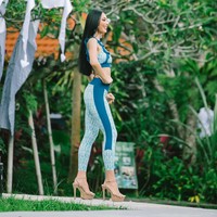 Inilah penampilan wakil Tanah Air, Andina Julie, Miss Grand Indonesia 2022 saat sportswear competition Miss Grand International 2022 di Bali. Foto: Dok. Yayasan Dunia Mega Bintang, Facebook Miss Grand International