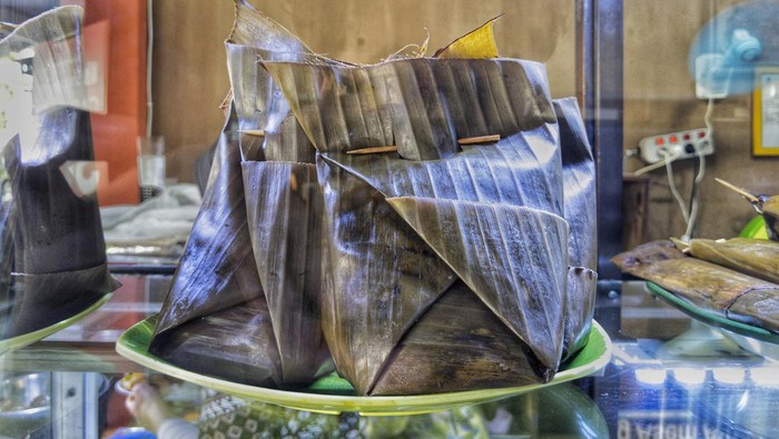 Botok, a traditional Indonesian Javanese food made from coconut, chili, salt, pepper, bay leaf, Chinese petai, tofu, anchovies and shrimp.