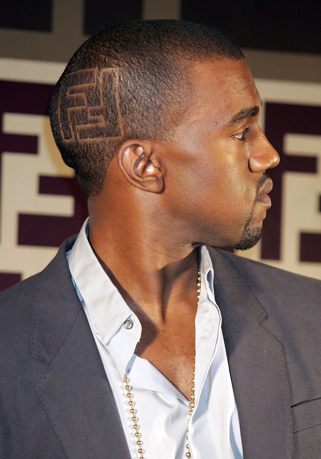 TOKYO - NOVEMBER 2006: Kanye West with Fendi logo shaved into his hair atttends the Fendi party celebrating their new line of bags 