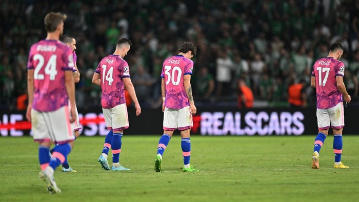 HAIFA, ISRAEL - OCTOBER 11: Arkadiusz Milik and Matias Soule of Juventus look dejected as they leave the field following their defeat during the UEFA Champions League group H match between Maccabi Haifa FC and Juventus at Sammy Ofer Stadium on October 11, 2022 in Haifa, Israel. (Photo by Tullio Puglia - UEFA/UEFA via Getty Images)