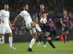 Skor 3-3 mengakhiri 90 menit. Hasil imbang bikin Inter saat ini mengumpulkan tujuh angka di posisi kedua. Sementara, Barcelona di urutan ketiga dengan empat poin. AP/Emilio Morenatti