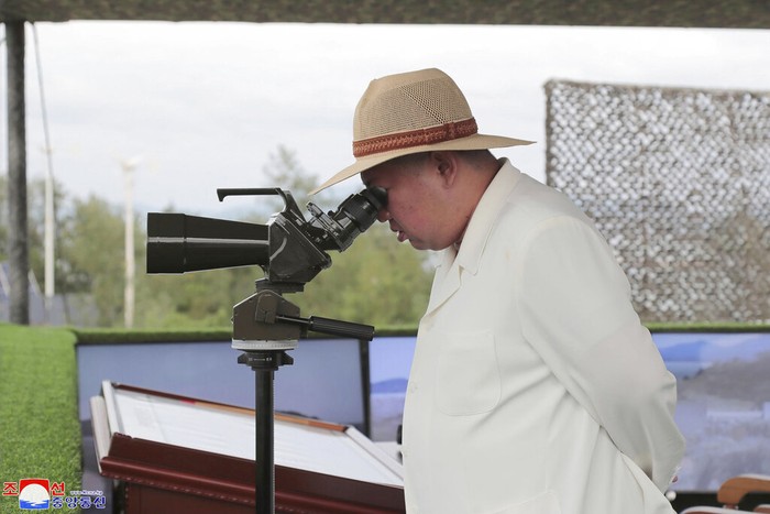 In this photo provided by the North Korean government, North Korean leader Kim Jong Un inspects military exercises at an undisclosed location in North Korea, Thursday, Oct. 6, 2022. Independent journalists were not given access to cover the event depicted in this image distributed by the North Korean government. The content of this image is as provided and cannot be independently verified. Korean language watermark on image as provided by source reads: KCNA which is the abbreviation for Korean Central News Agency. (Korean Central News Agency/Korea News Service via AP)