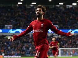 Mohamed Salah menempati daftar teratas hat-trick tercepat Liga Champions. Si Raja Mesir hanya butuh waktu 6 menit 12 detik kala Liverpool menghancurkan Rangers 7-1 di fase grup Liga Champions 2022/2023. (Foto: Getty Images/Alex Livesey - Danehouse)