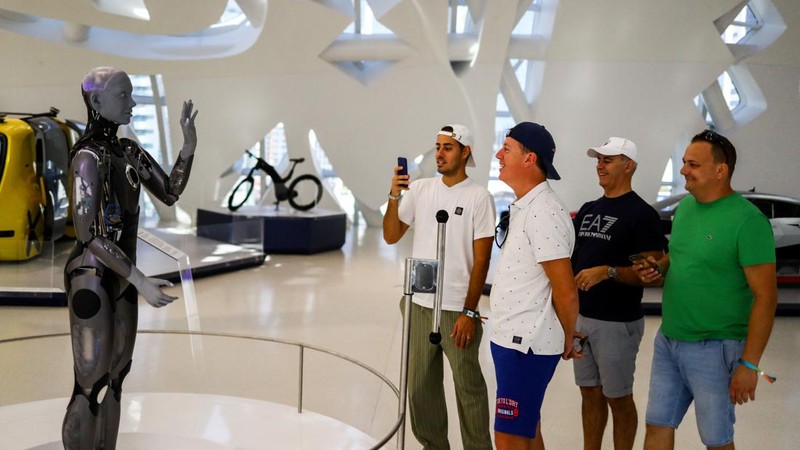 Ameca, a humanoid robot and member of the Museum of the Future staff interacts with visitors at the museum’s “Tomorrow Today” exhibition in Dubai, United Arab Emirates, October 13, 2022. REUTERS/Amr Alfiky