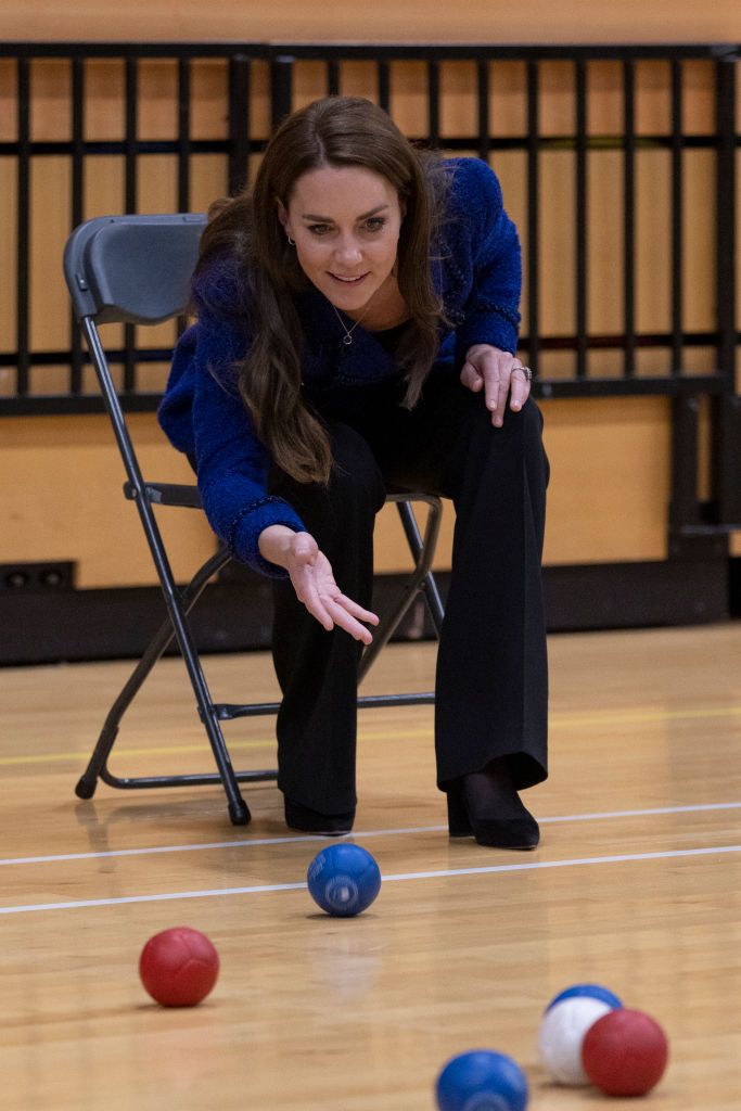 LONDON, ENGLAND - OCTOBER 13: Catherine, Princess of Wales plays boccia as she attends the 10th Anniversary Celebration of Coach Core at Copper Box Arena on October 13, 2022 in London, England. (Photo by Heathcliff O'Malley - WPA Pool/Getty Images)