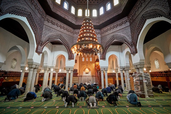 PARIS, FRANCE - OCTOBER 30: Friday prayers at the Grand Mosque in Paris on October 30, 2020 in Paris, France. After prayers there was a reading of a poem ‘For the Republique’ as a homily to French Muslims in support of the laws of the French Republique. The prayers took place under increased security as President Macron announced the number of soldiers patrolling the streets and guarding places of worship and schools would rise from 3,000 to 7,000. (Photo by Kiran Ridley/Getty Images)