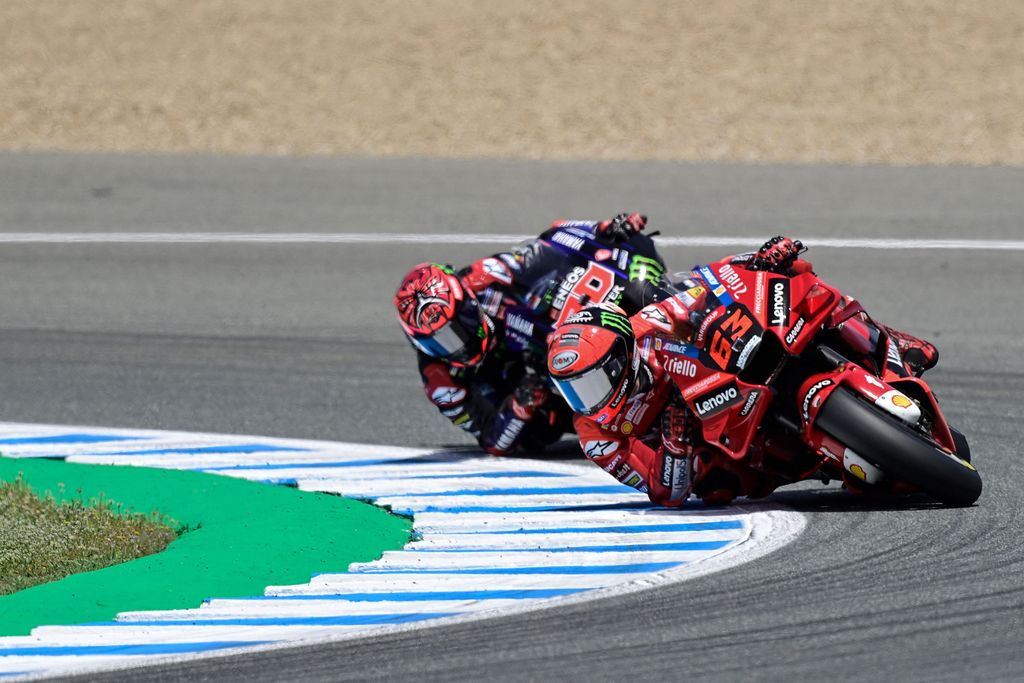 Ducati Italian rider Francesco Bagnaia (Front) and Yamaha French rider Fabio Quartararo compete in the MotoGP Spanish Grand Prix at the Jerez racetrack in Jerez de la Frontera on May 1, 2022. (Photo by JAVIER SORIANO / AFP) (Photo by JAVIER SORIANO/AFP via Getty Images)