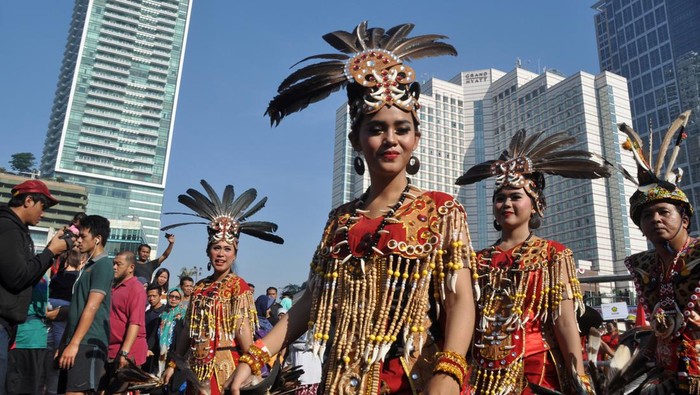 Jakarta, Indonesia - August 27, 2017: Dayak Borneo Culture participated in ASEAN Culture Parade in Thamrin - Sudirman Street, Jakarta-Indonesia