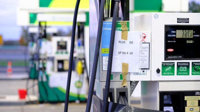 A paper reading Limited to 30 litres is displayed in a gas station in Mont-Pres-Chambord on October 14, 2022, as filling stations across France are low on petrol as a pay-related strike by workers at energy giant TotalEnergies entered its third week despite government pressure to negotiate. - Striking French refinery workers vowed on October 14, 2022 to pursue blockades after spurning a pay offer from industry leader TotalEnergies, prompting alarm over spreading fuel shortages ahead of broader protests in the coming days. (Photo by GUILLAUME SOUVANT / AFP) (Photo by GUILLAUME SOUVANT/AFP via Getty Images)